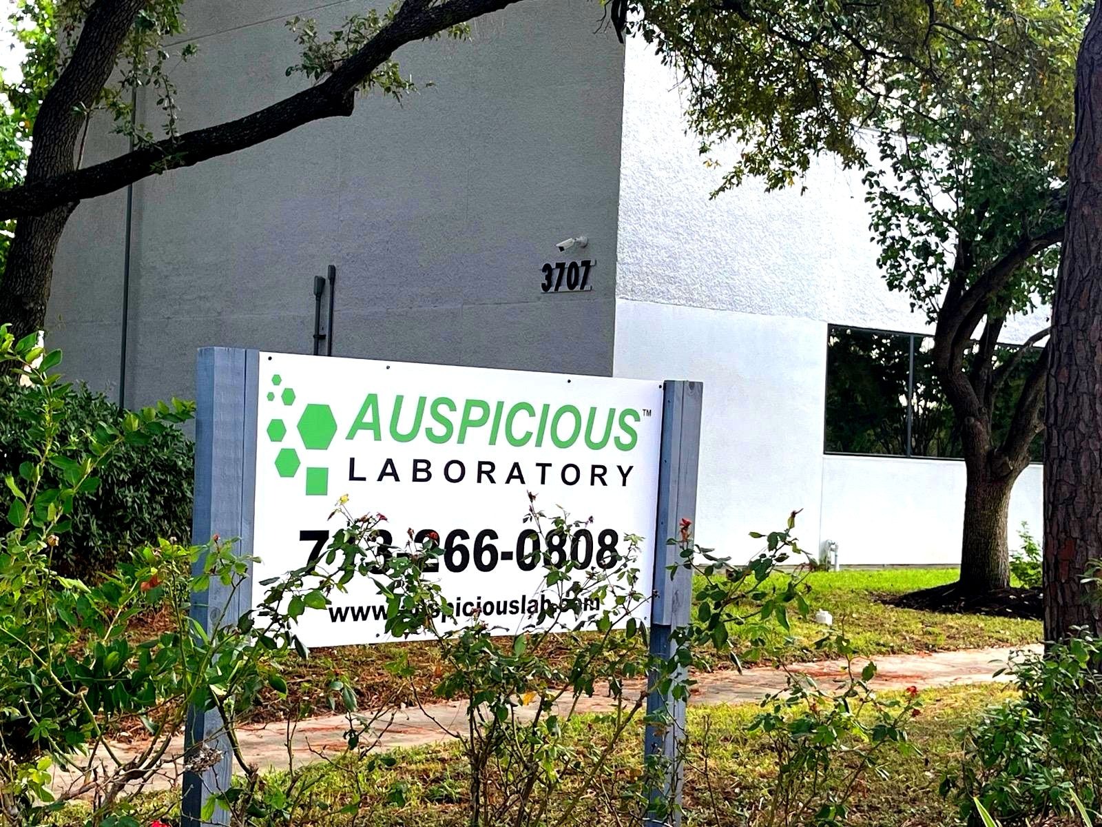 Auspicious Laboratory sign at 3707 Westcenter Dr, Houston